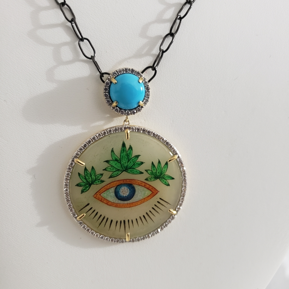 Elegant Eye Pendant Necklace with Turquoise Accent